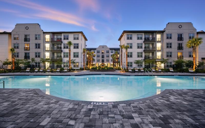 a pool in front of a building