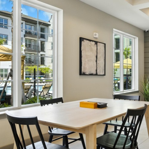 a room with a table and chairs